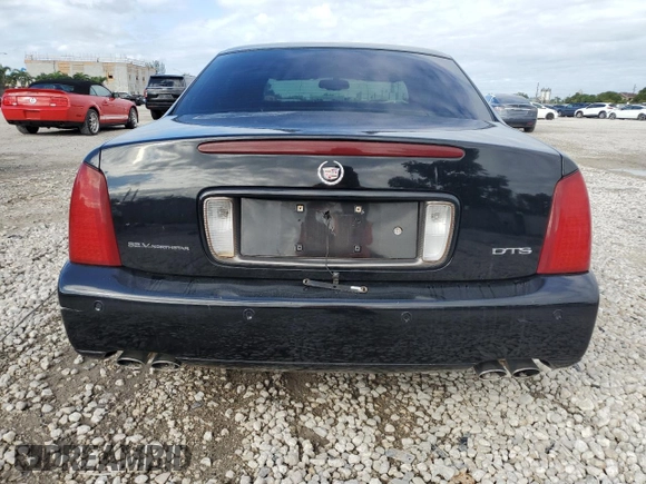 2002 Cadillac DeVille DTS with VIN 1G6KF57962U233811, listed as a Copart auction lot 80435034 with 62,005 mi miles and Salvage Title. Bid and sale history available at carsss.com. Image 6.
