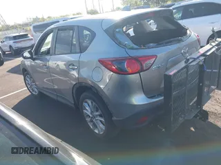 2013 Mazda CX-5 Grand Touring with VIN JM3KE2DEXD0130585, listed as a IAAI auction lot 42001388 with 66,348 mi miles. Bid and sale history available at carsss.com. Image 3.
