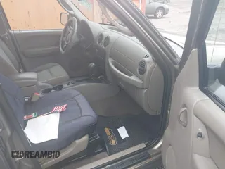 2005 Jeep Liberty Sport z VIN 1J4GL48K65W551101, wystawiony jako IAAI lot #42362067 z przebiegiem 203 308 mil mil oraz . Historia ofert i sprzedaży dostępna na DreamBid. Obrazek 5.