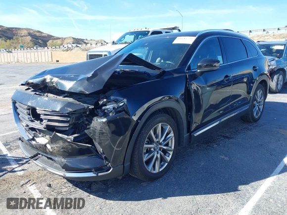 2018 Mazda CX-9 Grand Touring z VIN JM3TCADY8J0221221, wystawiony jako IAAI lot #41644721 z przebiegiem 41 510 mil mil oraz . Historia ofert i sprzedaży dostępna na DreamBid. Obrazek 17.
