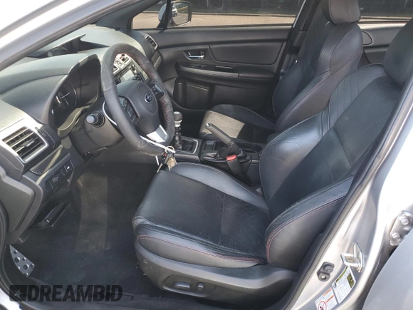2016 Subaru WRX Limited with VIN JF1VA1J65G9818699, listed as a Copart auction lot 52116595 with 123,247 mi miles and Salvage title. Bid and sale history available at DreamBid. Image 7.