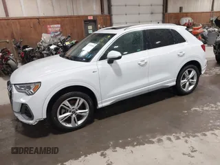 2021 Audi Q3 S line Premium Plus with VIN WA1EECF31M1060356, listed as a IAAI auction lot 42242850 with 83,380 mi miles and . Bid and sale history available at DreamBid. Image 18.
