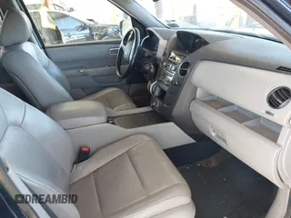 2013 Honda Pilot Touring with VIN 5FNYF4H95DB079782, listed as a IAAI auction lot 42737391 with 152,830 mi miles and . Bid and sale history available at DreamBid. Image 5.