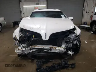 2016 Lincoln MKS с VIN 1LNHL9DK0GG601318, выставлен на аукционе Copart как лот 80114224 с пробегом 67 526 миль миль и Списание • Salvage title. История ставок и продаж доступна на DreamBid. Изображение 5.