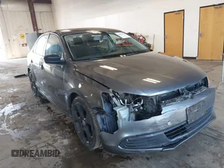 2014 Volkswagen Jetta Sedan S with VIN 3VW2K7AJ5EM410491, listed as a IAAI auction lot 42083614 with 65,960 mi miles. Bid and sale history available at carsss.com. Image 1.