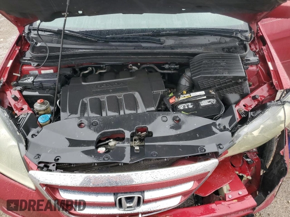 2006 Honda Odyssey EX-L z VIN 5FNRL38756B416802, wystawiony jako Copart lot #57588515 z przebiegiem 169 093 mil mil oraz Szkoda całkowita • Salvage title. Historia ofert i sprzedaży dostępna na DreamBid. Obrazek 12.