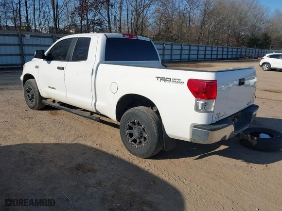 2013 Toyota Tundra 4WD Truck with VIN 5TFUW5F10DX308750, listed as a IAAI auction lot 41768677 with 84,026 mi miles. Bid and sale history available at carsss.com. Image 3.
