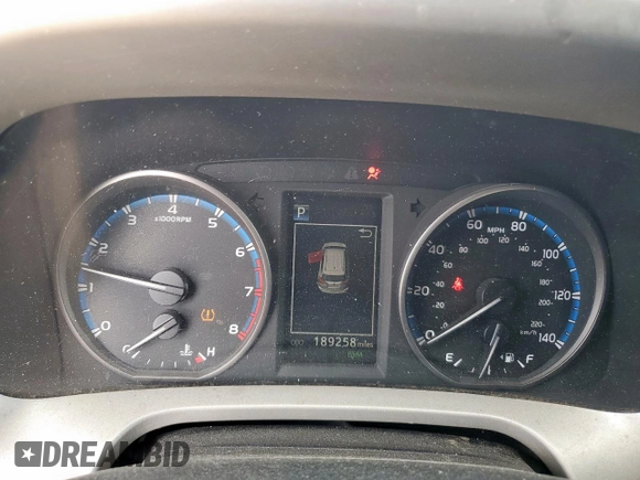 2018 Toyota RAV4 XLE with VIN 2T3WFREV2JW409292, listed as a Copart auction lot 61577355 with 189,258 mi miles and Salvage title. Bid and sale history available at DreamBid. Image 9.