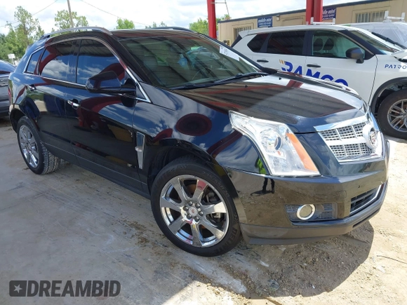 2012 Cadillac SRX Premium Collection z VIN 3GYFNCE36CS615725, wystawiony jako IAAI lot #42738584 z przebiegiem 156 625 mil mil oraz . Historia ofert i sprzedaży dostępna na DreamBid. Obrazek 1.