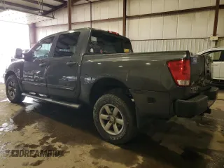 2010 Nissan Titan LE with VIN 1N6AA0EC2AN325657, listed as a Copart auction lot 88307625 with 147,010 mi miles and Salvage Title. Bid and sale history available at carsss.com. Image 2.
