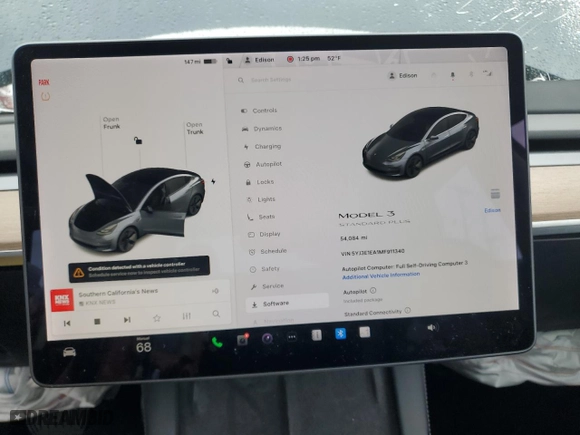 2021 Tesla Model 3 Standard Range Plus with VIN 5YJ3E1EA1MF911340, listed as a Copart auction lot 45011375 with 54,084 mi miles and Salvage Title. Bid and sale history available at carsss.com. Image 9.