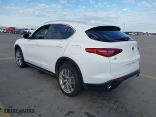 2018 Alfa Romeo Stelvio with VIN ZASFAKANXJ7B73800, listed as a IAAI auction lot 41028864 with 102,518 mi miles. Bid and sale history available at carsss.com. Image 3.