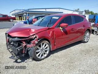 2017 Mazda 3 Touring with VIN JM1BN1L7XH1115929, listed as a Copart auction lot 52010165 with 86,997 mi miles and Salvage title. Bid and sale history available at DreamBid. Image 1.