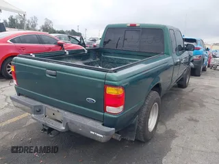 1999 Ford Ranger XLT with VIN 1FTYR14X2XPB07901, listed as a IAAI auction lot 41509235 with 115,418 mi miles. Bid and sale history available at carsss.com. Image 4.