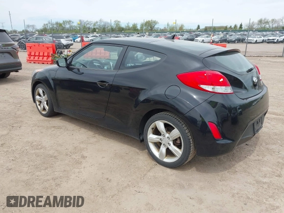2013 Hyundai Veloster w/Gray Int with VIN KMHTC6AD6DU179826, listed as a IAAI auction lot 42151479 with 82,643 mi miles. Bid and sale history available at carsss.com. Image 3.