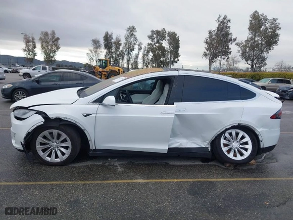 2018 Tesla Model X 75D with VIN 5YJXCBE2XJF102341, listed as a IAAI auction lot 41731511 with NaN miles. Bid and sale history available at carsss.com. Image 14.