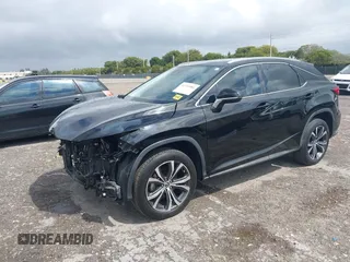 2020 Lexus RX 350 with VIN 2T2HZMAA9LC153571, listed as a IAAI auction lot 41710981 with 34,354 mi miles and . Bid and sale history available at DreamBid. Image 2.