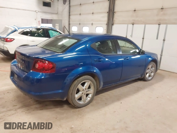 2013 Dodge Avenger SE with VIN 1C3CDZAB6DN599070, listed as a IAAI auction lot 42025692 with 245,920 mi miles and . Bid and sale history available at carsss.com. Image 4.