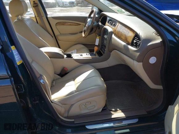 2005 Jaguar S-Type with VIN SAJWA01T95FN51551, listed as a IAAI auction lot 41637854 with 90,075 mi miles and . Bid and sale history available at DreamBid. Image 5.