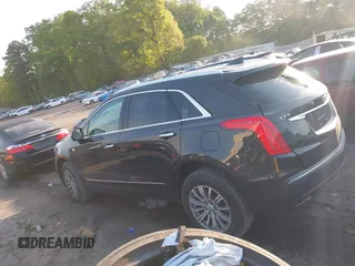 2019 Cadillac XT5 Luxury FWD z VIN 1GYKNCRS2KZ251207, wystawiony jako IAAI lot #42066271 z przebiegiem 128 226 mil mil oraz . Historia ofert i sprzedaży dostępna na DreamBid. Obrazek 14.