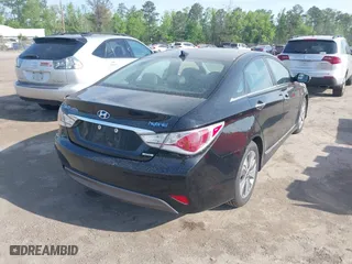 2015 Hyundai Sonata Hybrid Limited with VIN KMHEC4A44FA129122, listed as a IAAI auction lot 42098724 with 140,792 mi miles. Bid and sale history available at carsss.com. Image 4.