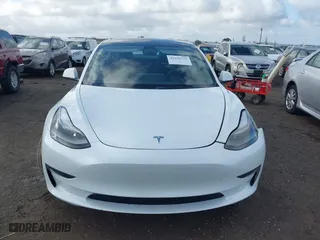 2023 Tesla Model 3 with VIN 5YJ3E1EA4PF405361, listed as a IAAI auction lot 41932723 with 28,487 mi miles. Bid and sale history available at carsss.com. Image 13.