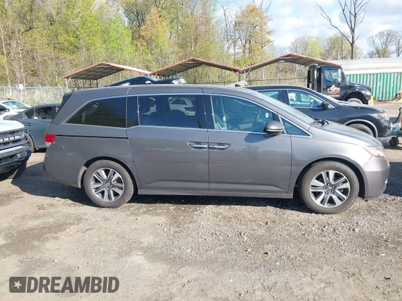 2015 Honda Odyssey Touring Elite with VIN 5FNRL5H99FB094727, listed as a IAAI auction lot 42001288 with 254,015 mi miles and . Bid and sale history available at DreamBid. Image 14.