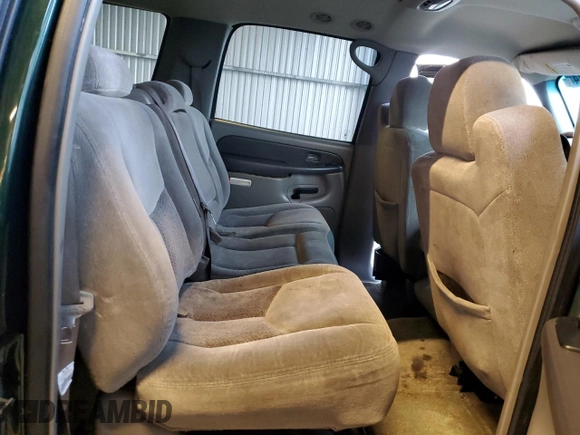 2003 Chevrolet Suburban Z71 z VIN 3GNFK16T43G241210, wystawiony jako Copart lot #86017624 z przebiegiem 217 506 mil mil oraz Szkoda całkowita • Salvage title. Historia ofert i sprzedaży dostępna na DreamBid. Obrazek 11.