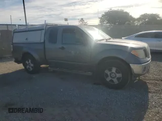 2005 Nissan Frontier SE with VIN 1N6AD06U75C427102, listed as a Copart auction lot 81994614 with 216,750 mi miles and Salvage title. Bid and sale history available at DreamBid. Image 4.