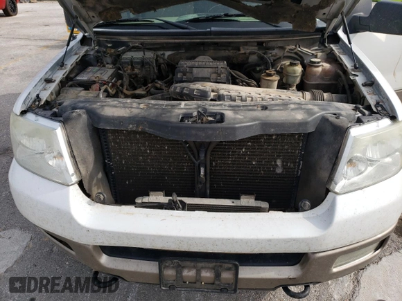 2005 Ford F-150 XLT with VIN 1FTPW14565KE92649, listed as a Copart auction lot 51474055 with 299,766 mi miles and Salvage Title. Bid and sale history available at carsss.com. Image 12.