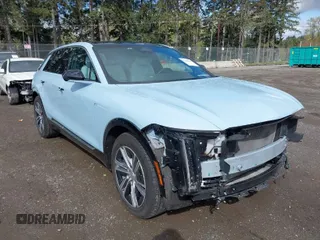 2024 Cadillac LYRIQ Luxury z VIN 1GYKPPRL2RZ103577, wystawiony jako IAAI lot #42010896 z przebiegiem 26 296 mil mil oraz . Historia ofert i sprzedaży dostępna na DreamBid. Obrazek 1.