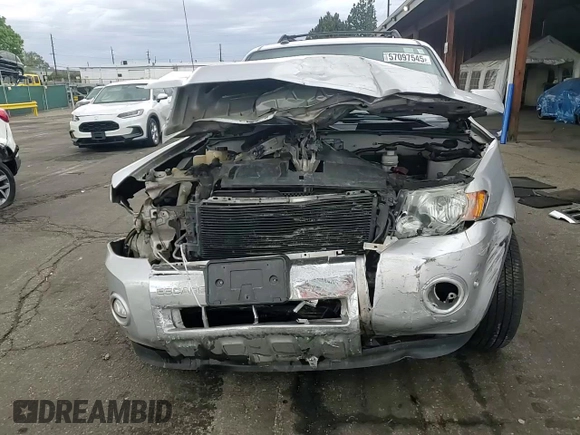2010 Ford Escape Limited с VIN 1FMCU9EG0AKD42965, выставлен на аукционе Copart как лот 57097545 с пробегом 153 370 миль миль и Списание • Salvage title. История ставок и продаж доступна на DreamBid. Изображение 15.