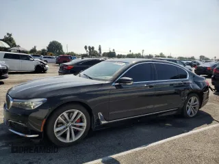 2016 BMW 7 Series 740i with VIN WBA7E2C59GG547804, listed as a Copart auction lot 68620463 with 122,937 mi miles. Bid and sale history available at carsss.com. Image 1.