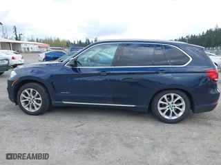2015 BMW X5 xDrive35d with VIN 5UXKS4C55F0J98874, listed as a IAAI auction lot 42030583 with 151,079 mi miles. Bid and sale history available at carsss.com. Image 14.
