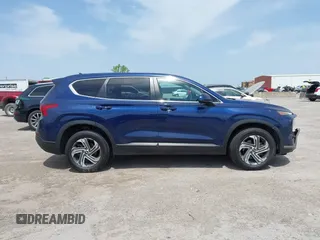 2021 Hyundai Santa Fe SE with VIN 5NMS14AJ2MH339403, listed as a IAAI auction lot 42024896 with 91,734 mi miles and . Bid and sale history available at DreamBid. Image 13.