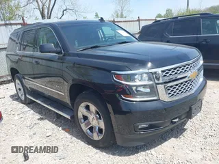 2018 Chevrolet Tahoe LT with VIN 1GNSKBKC7JR245565, listed as a IAAI auction lot 42097400 with 123,709 mi miles and . Bid and sale history available at DreamBid. Image 1.