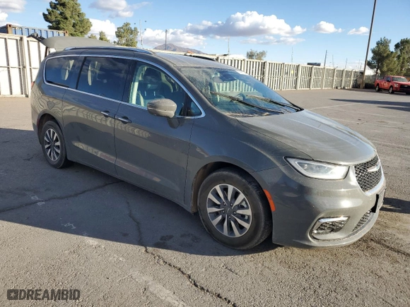 2021 Chrysler Pacifica Hybrid Touring L with VIN 2C4RC1L73MR581213, listed as a Copart auction lot 78910244 with 104,426 mi miles and Salvage Title. Bid and sale history available at carsss.com. Image 4.