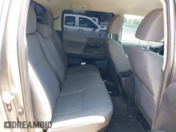 2021 Toyota Tacoma SR with VIN 3TYAX5GN3MT015565, listed as a IAAI auction lot 42241436 with 46,921 mi miles and . Bid and sale history available at DreamBid. Image 8.