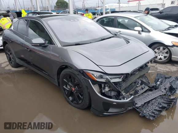 2020 Jaguar I-Pace SE with VIN SADHC2S13L1F79454, listed as a IAAI auction lot 41728860 with 32,035 mi miles and . Bid and sale history available at DreamBid. Image 1.