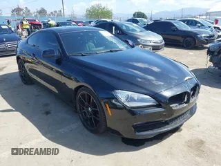 2013 BMW 6 Series 650i with VIN WBAYM9C57DDW20178, listed as a IAAI auction lot 41933561 with 72,886 mi miles and . Bid and sale history available at carsss.com. Image 1.
