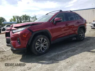 2023 Toyota RAV4 Hybrid XLE Premium with VIN JTMB6RFV2PD541262, listed as a Copart auction lot 60106845 with 32,447 mi miles and Salvage title. Bid and sale history available at DreamBid. Image 1.