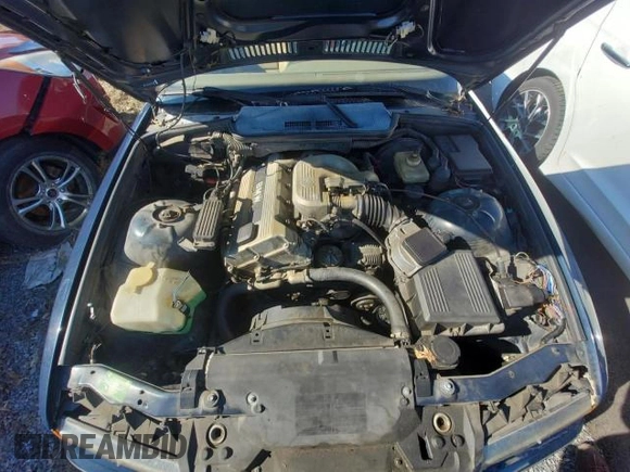 1995 BMW 3 Series 318iC with VIN WBABK6328SED18313, listed as a Copart auction lot 51153305 with 285,000 mi miles and Salvage Title. Bid and sale history available at carsss.com. Image 7.