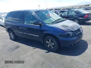 2005 Dodge Caravan SXT with VIN 1D8GP45R65B280660, listed as a IAAI auction lot 42169027 with 246,407 mi miles and . Bid and sale history available at carsss.com. Image 1.