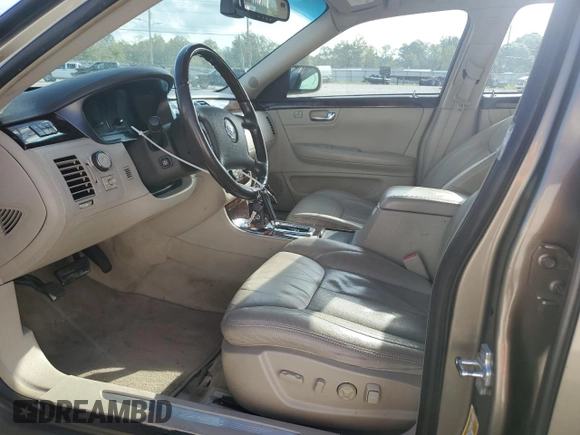 2011 Cadillac DTS Premium Collection z VIN 1G6KH5E66BU122663, wystawiony jako Copart lot #73112894 z przebiegiem 140 360 mil mil oraz Szkoda całkowita • Salvage title. Historia ofert i sprzedaży dostępna na DreamBid. Obrazek 7.