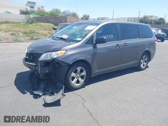 2012 Toyota Sienna with VIN 5TDZK3DC9CS261944, listed as a IAAI auction lot 41885359 with 184,918 mi miles. Bid and sale history available at carsss.com. Image 2.