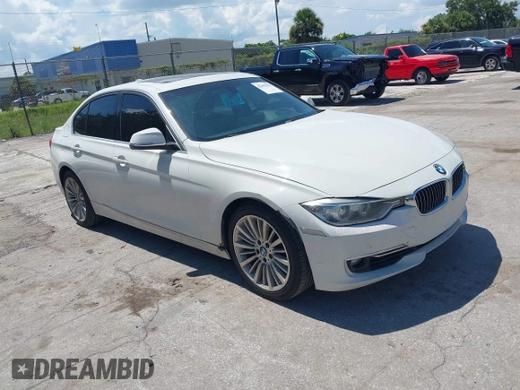 2014 BMW 3 Series 328i with VIN WBA3A5C54EP600398, listed as a IAAI auction lot 42665302 with 117,012 mi miles and . Bid and sale history available at DreamBid. Image 1.