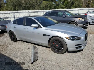 2017 Jaguar XE with VIN SAJAE4BN7HA971719, listed as a Copart auction lot 43630865 with 93,434 mi miles and Salvage Title. Bid and sale history available at DreamBid. Image 4.