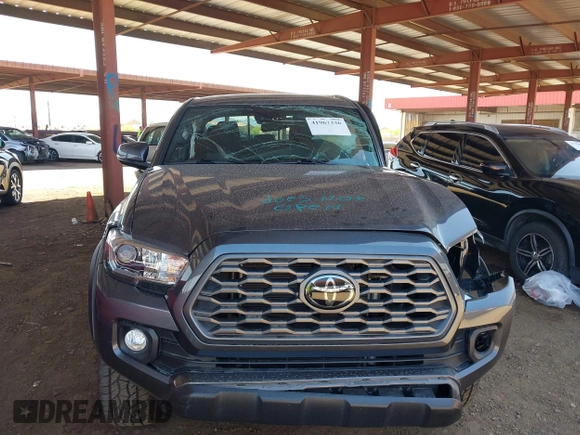 2022 Toyota Tacoma SR z VIN 3TYCZ5AN1NT062445, wystawiony jako IAAI lot #41967336 z przebiegiem Nie podano mil oraz . Historia ofert i sprzedaży dostępna na DreamBid. Obrazek 6.