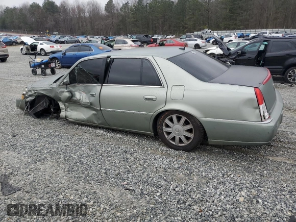 2006 Cadillac DTS 1SD z VIN 1G6KD57YX6U193025, wystawiony jako Copart lot #45784605 z przebiegiem Nie podano mil oraz Szkody całkowita. Historia ofert i sprzedaży dostępna na DreamBid. Obrazek 2.