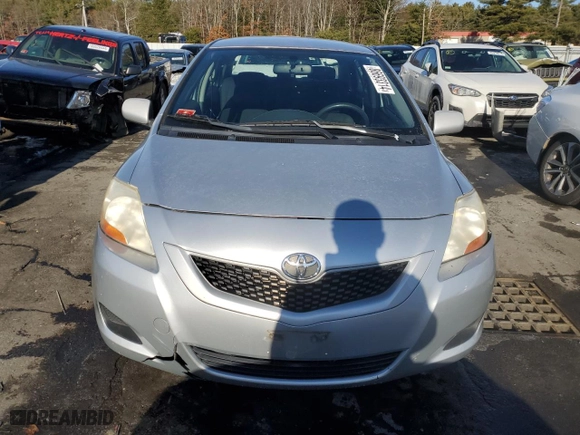 2009 Toyota Yaris with VIN JTDBT903994041702, listed as a Copart auction lot 86693314 with 136,317 mi miles and Salvage Title. Bid and sale history available at carsss.com. Image 5.